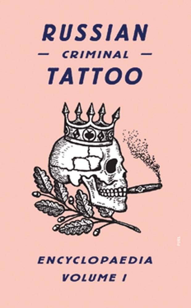 Book cover featuring a crowned skull smoking, with text: “Russian Criminal Tattoo Encyclopaedia Volume I,” capturing the gritty essence of Russian Criminal Tattoo culture.